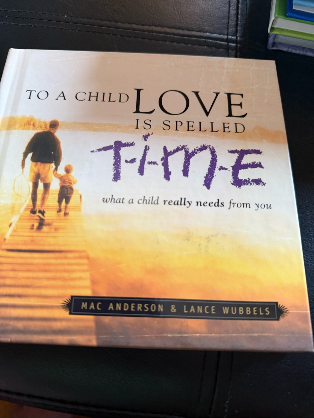 To a Child Love Is Spelled Time - Inspirational Book (Purple/Orange Cover)